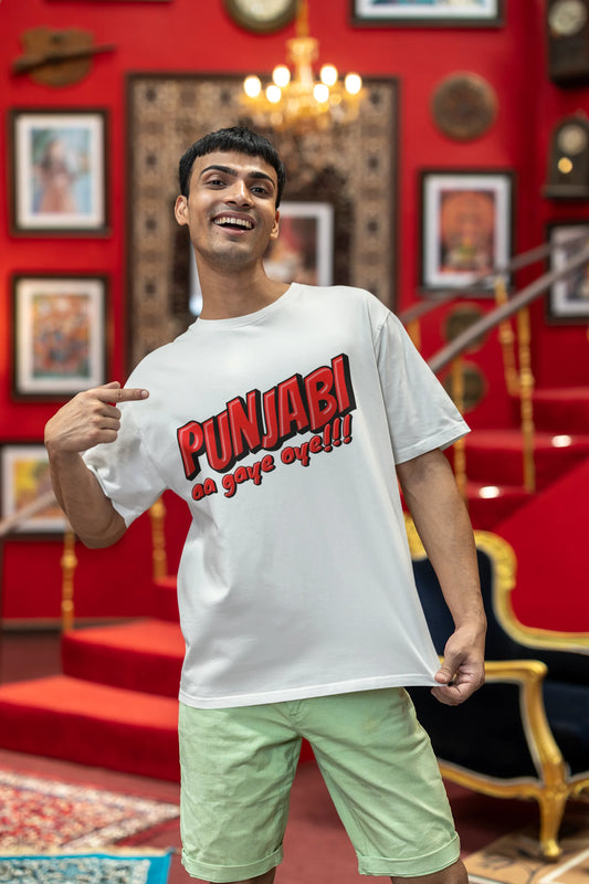 Second front view of a male model wearing an off-white oversized t-shirt with the text "Punjabi Aa Gaye Oye".