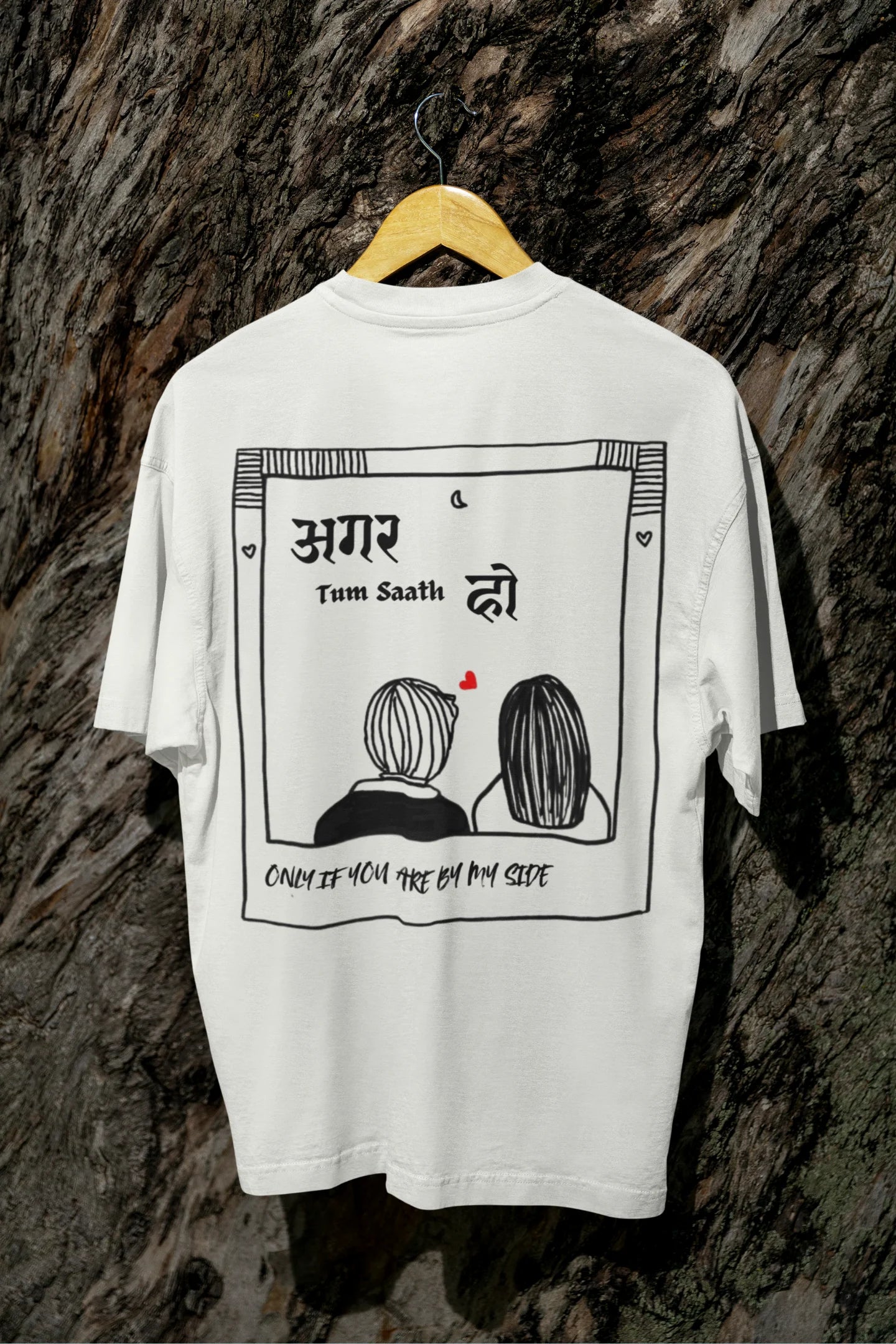 Back view of an off white oversized t-shirt featuring a design depicting a couple, symbolizing togetherness and romance, inspired by the Hindi film "Agar Tum Saath Ho."