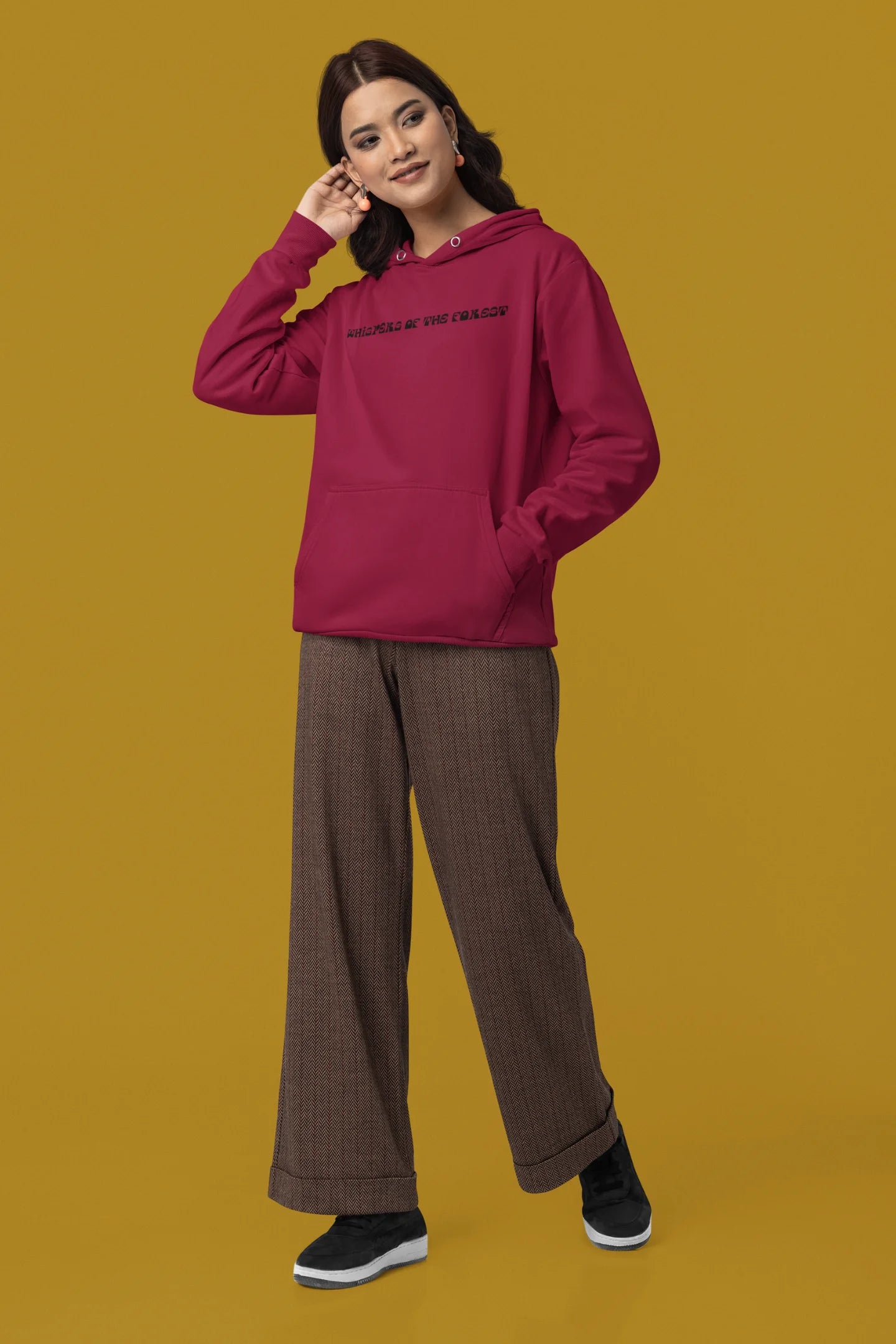 Third front view of a female model wearing a maroon hoodie with a design featuring three different types of butterflies, symbolizing the beauty and diversity of nature.