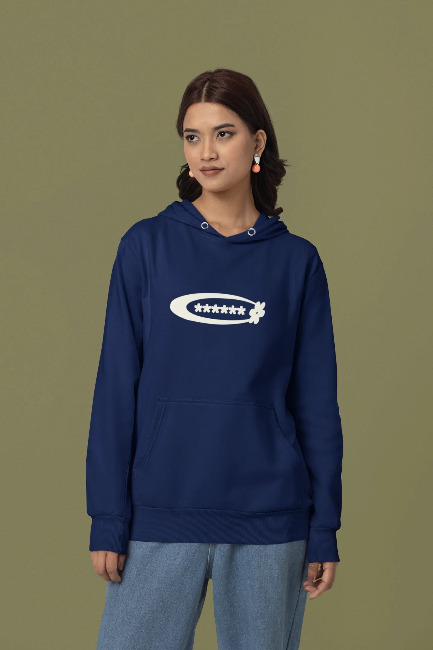 First front of a female model model wearing a navy hoodie with a design featuring berry bushes overflowing with fruit, symbolizing the abundance and beauty of nature.
