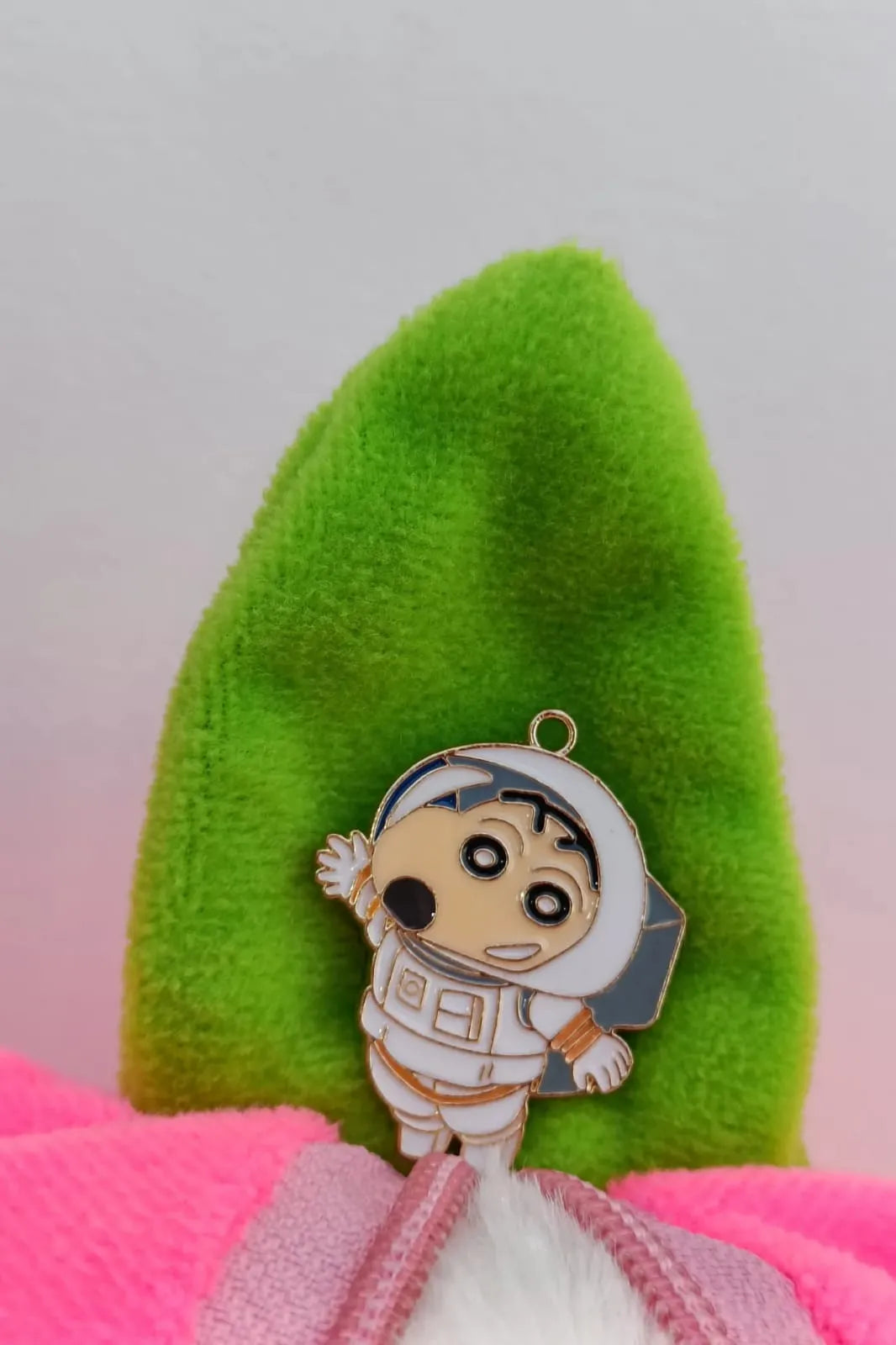Fifth view of a cute charm featuring Shinchan in a space suit, exploring the cosmos.
