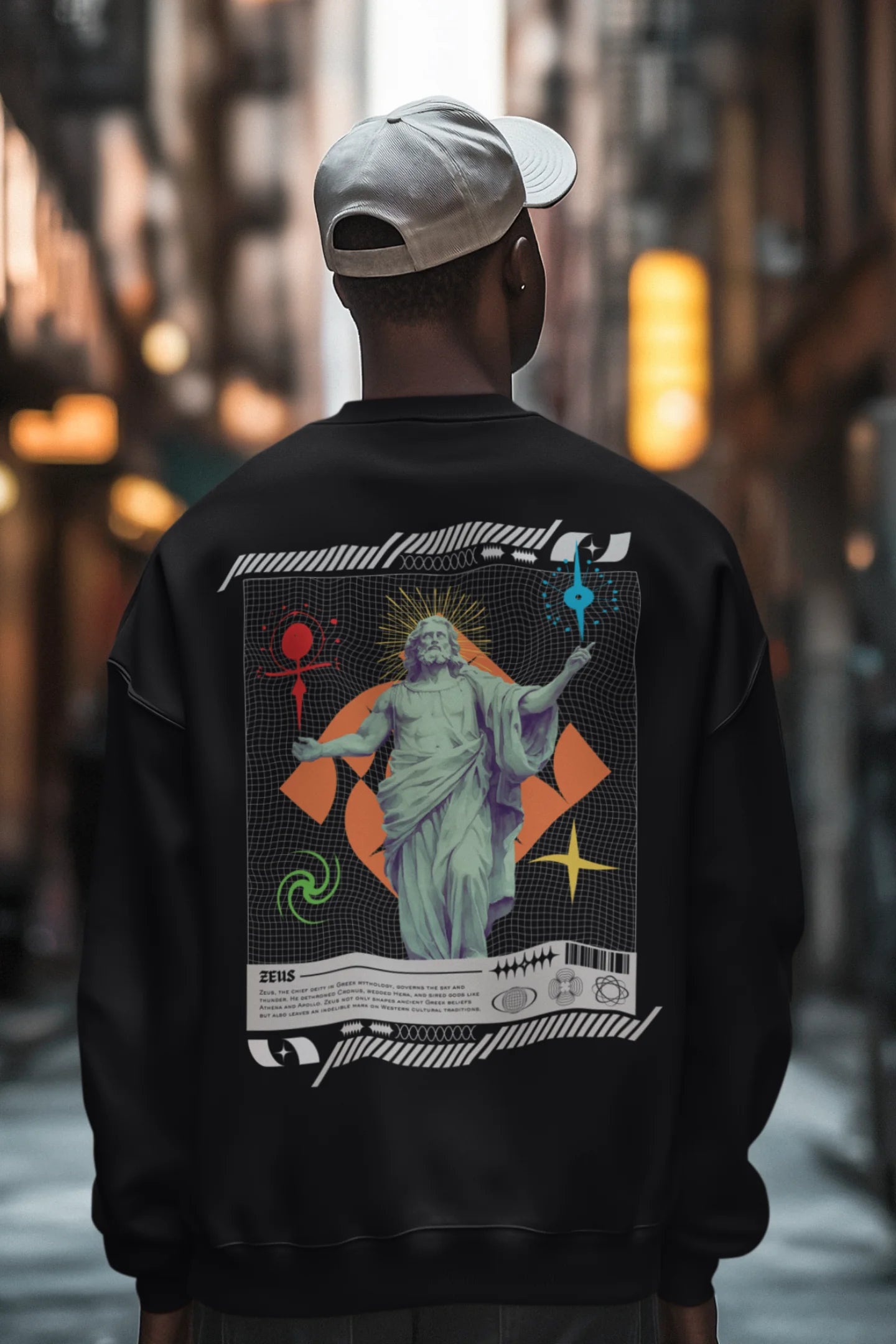 First back view of a male model wearing a brutalist-inspired black sweatshirt with a stylized image of Zeus, king of the gods, in a concrete-like design.