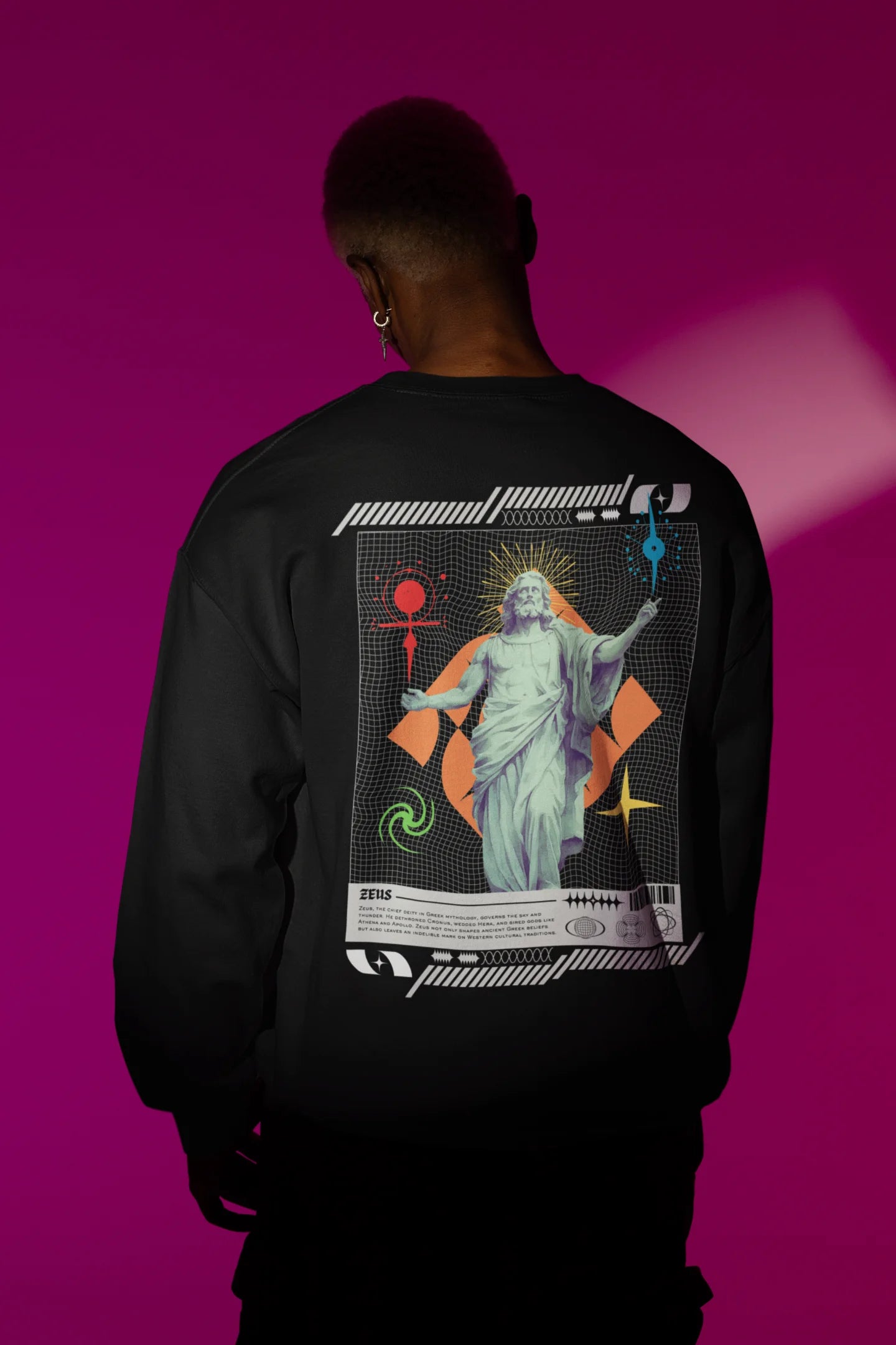 Second back view of a male model wearing a brutalist-inspired black sweatshirt with a stylized image of Zeus, king of the gods, in a concrete-like design.
