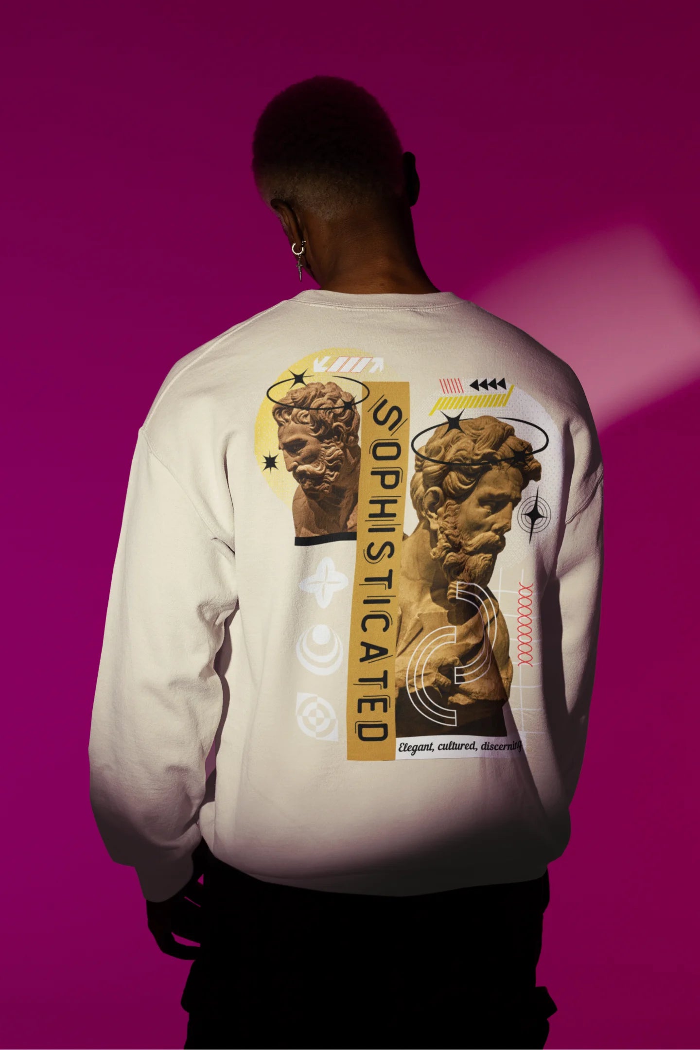Second back view of a male model wearing a cream sweatshirt with a sophisticated brutalist design featuring a Greek god statue.