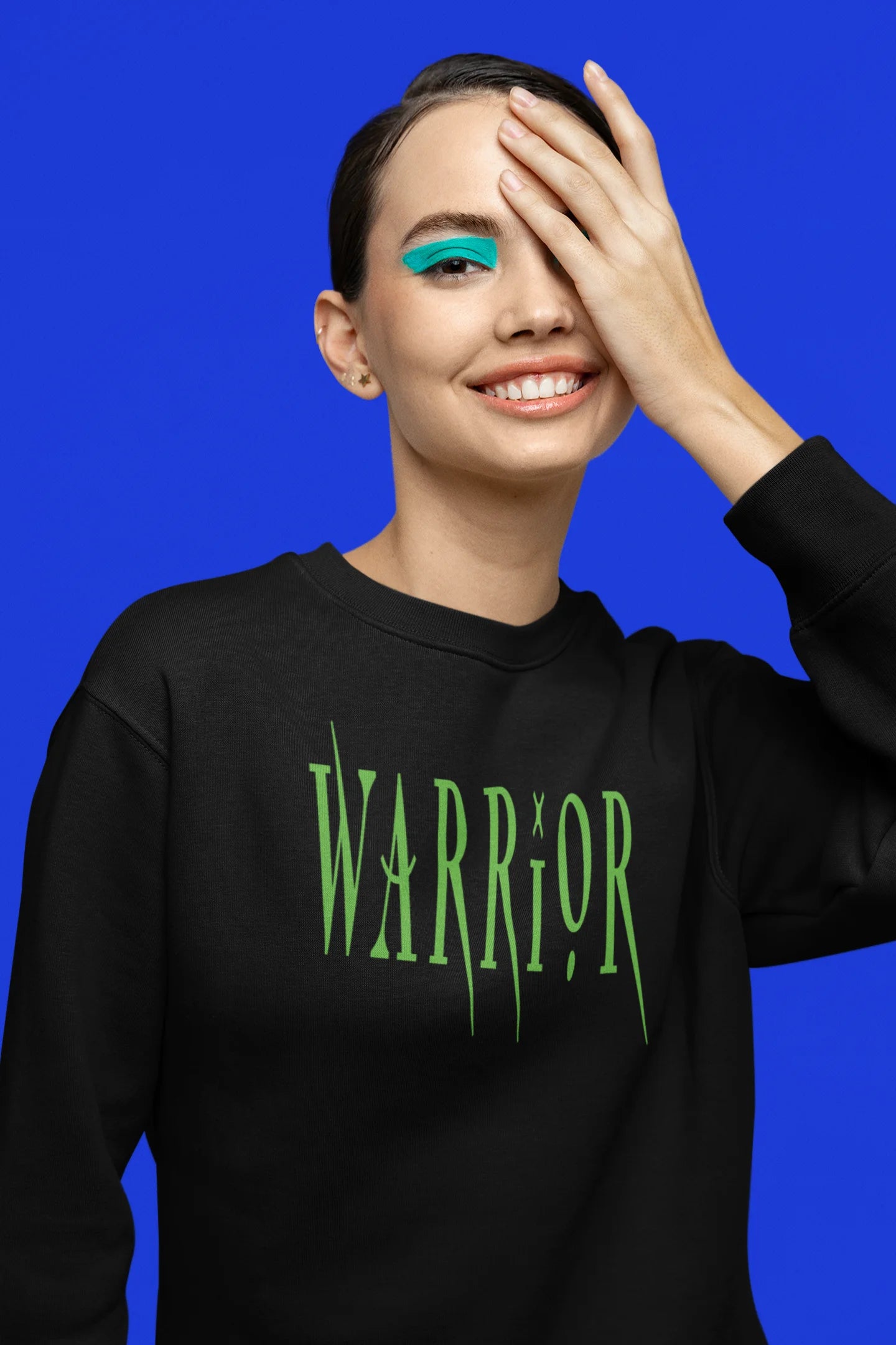 Third front view of a female model wearing a black sweatshirt with a brutalist warrior and horseback battle design.