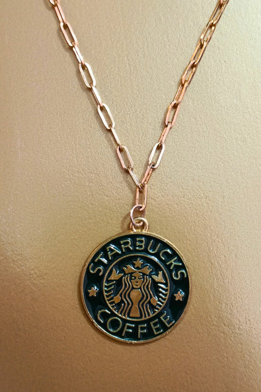 2nd view of a gold chain necklace with a small pendant featuring the Starbucks logo.