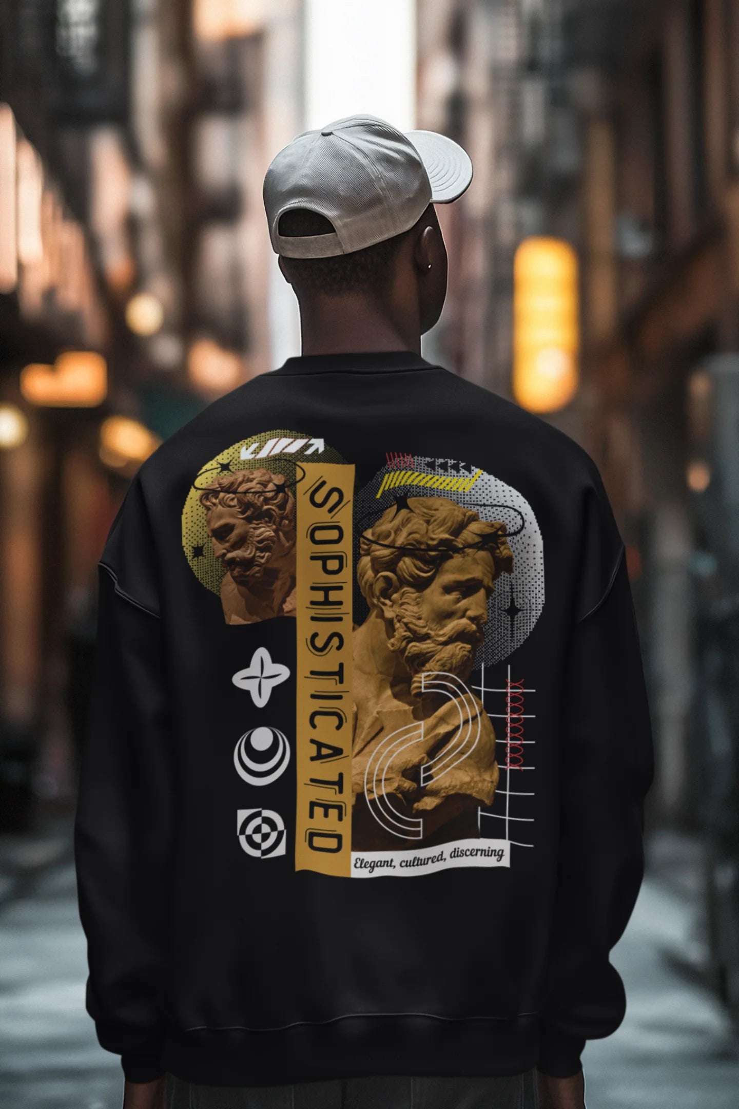 First back view of a male model wearing a black sweatshirt with a sophisticated brutalist design featuring a Greek god statue.