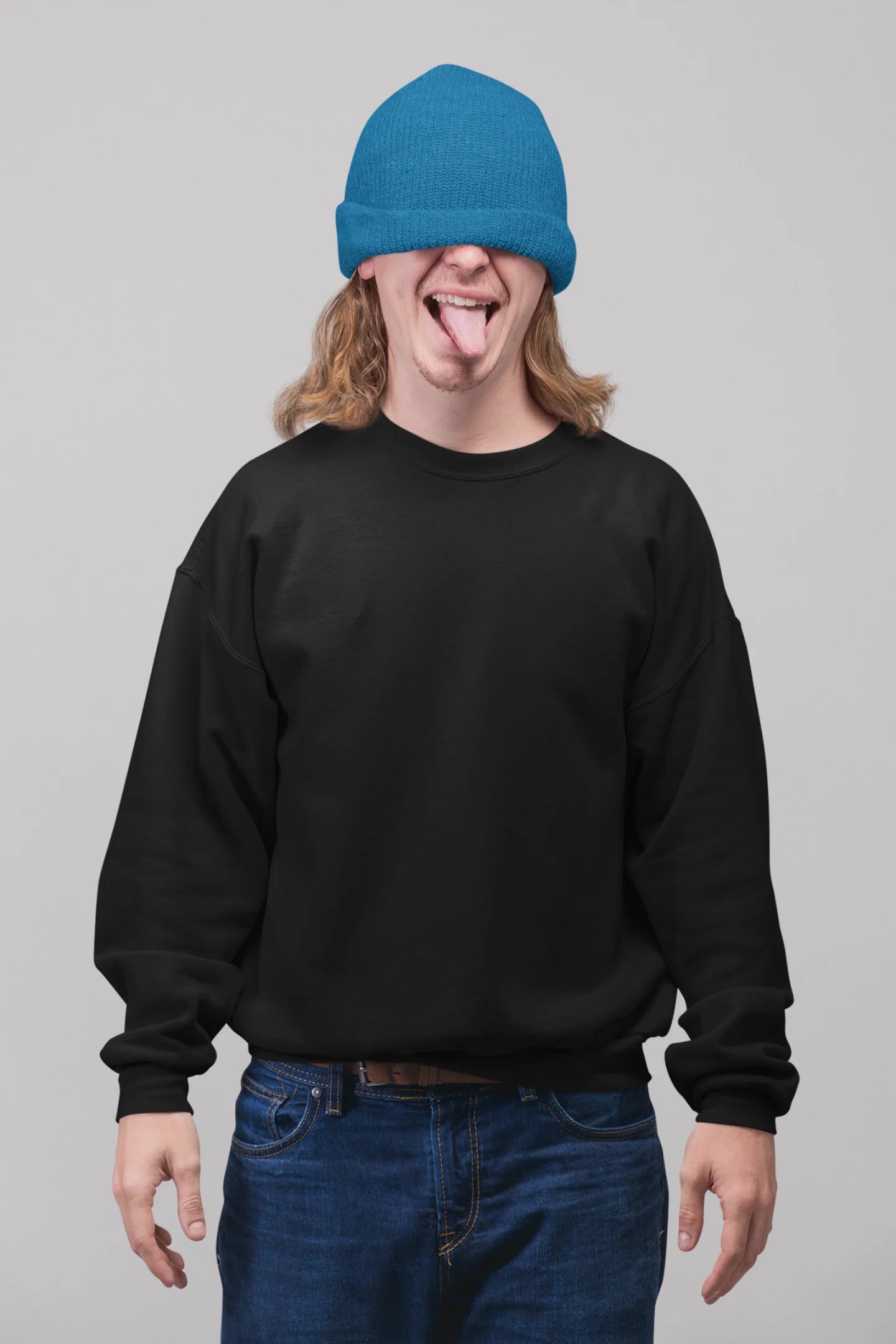 2nd front view of a male model wearing a black sweatshirt featuring a beautiful rose design with inspirational text, offering a calming and uplifting aesthetic.
