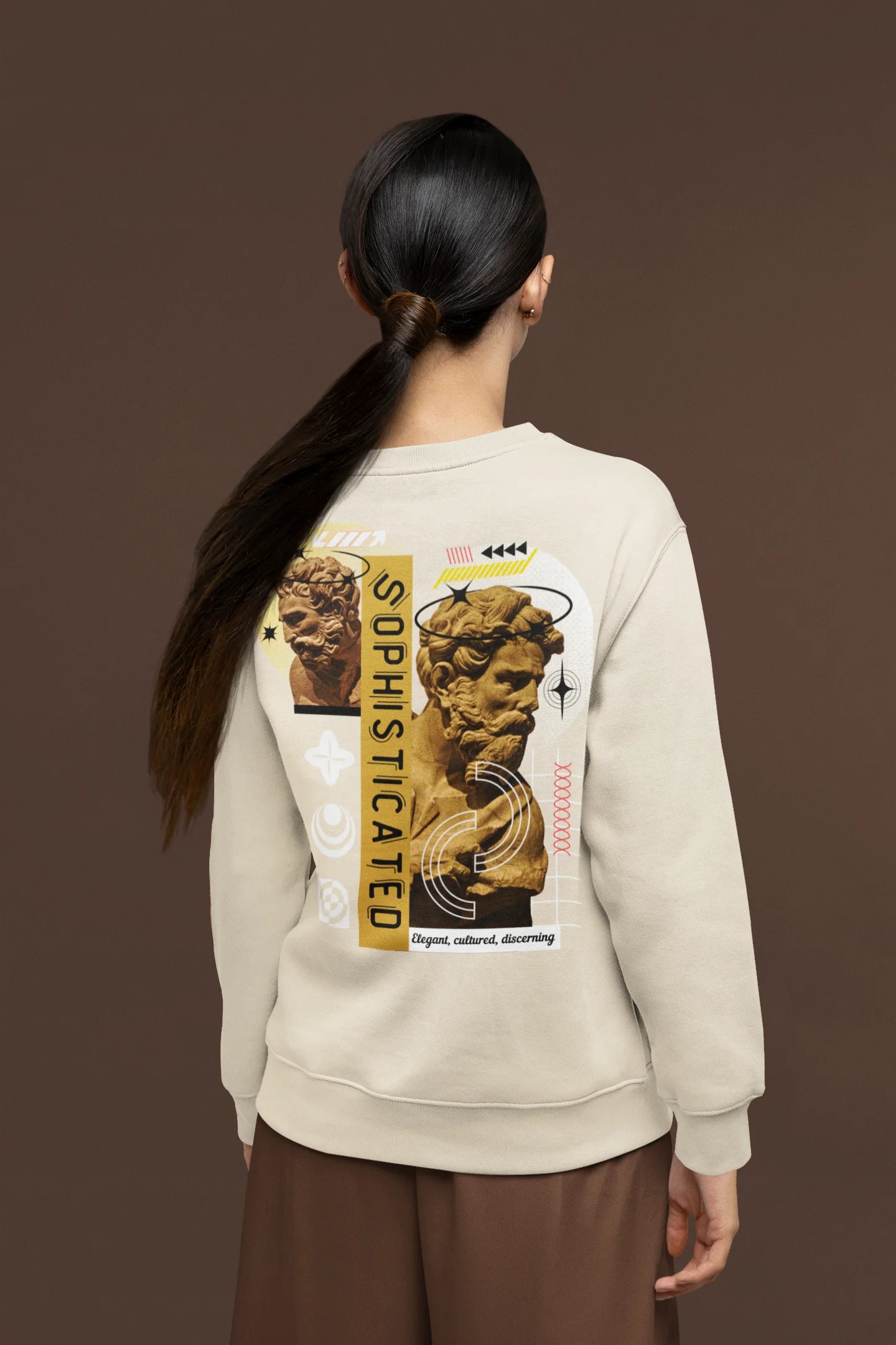 Back view of a female model wearing a cream sweatshirt with a sophisticated brutalist design featuring a Greek god statue.
