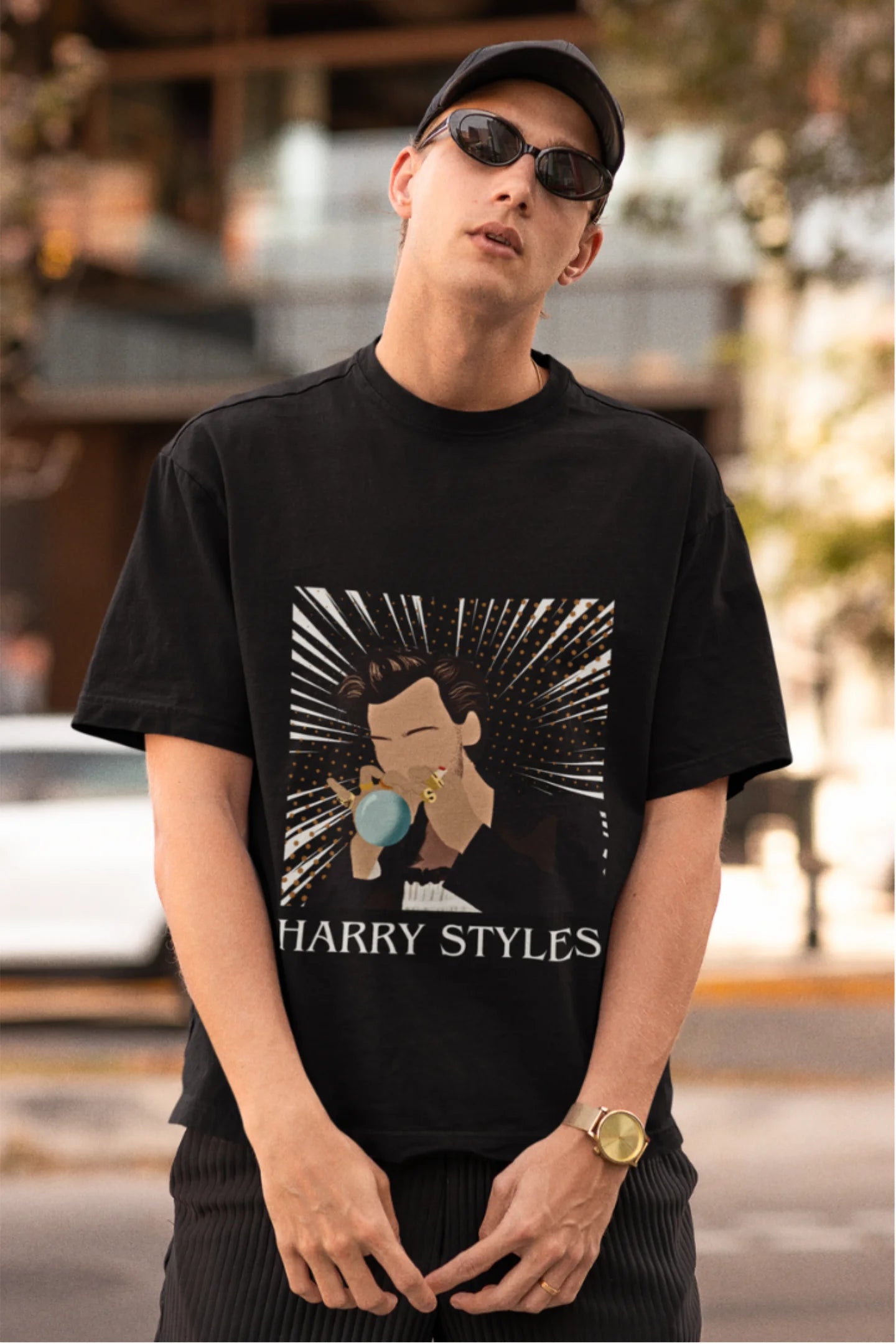 First image of man wearing One Direction-inspired black oversized t-shirt with Harry Styles design - ideal Harry Styles merch for fans of 1D and Harry Styles