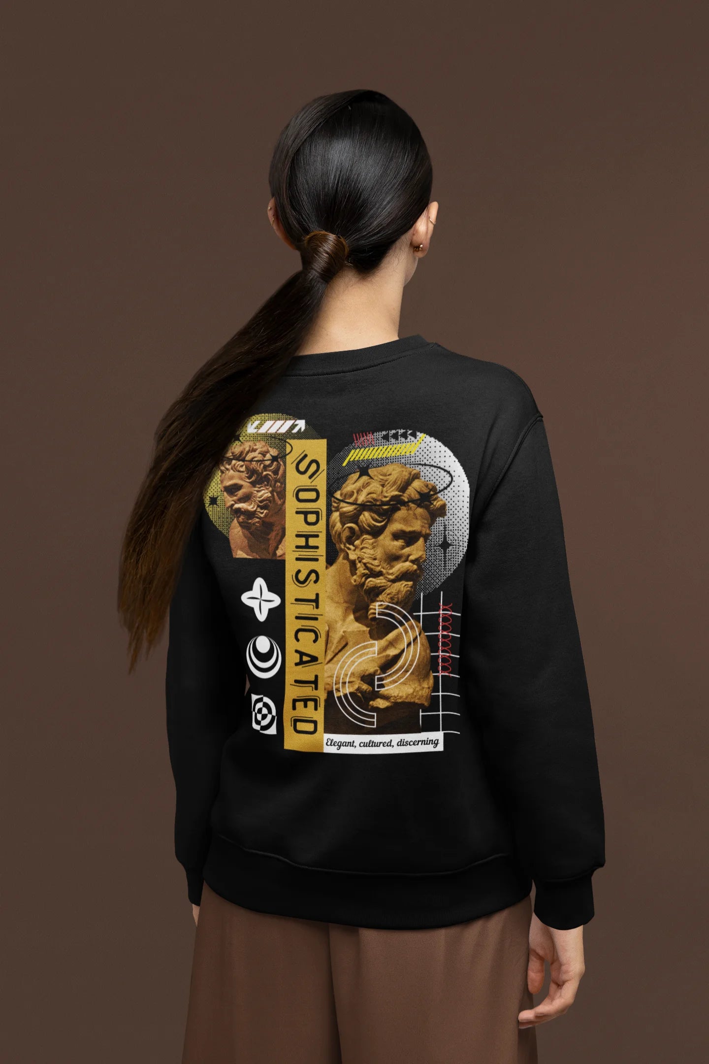 Back view of a female model wearing a black sweatshirt with a sophisticated brutalist design featuring a Greek god statue.