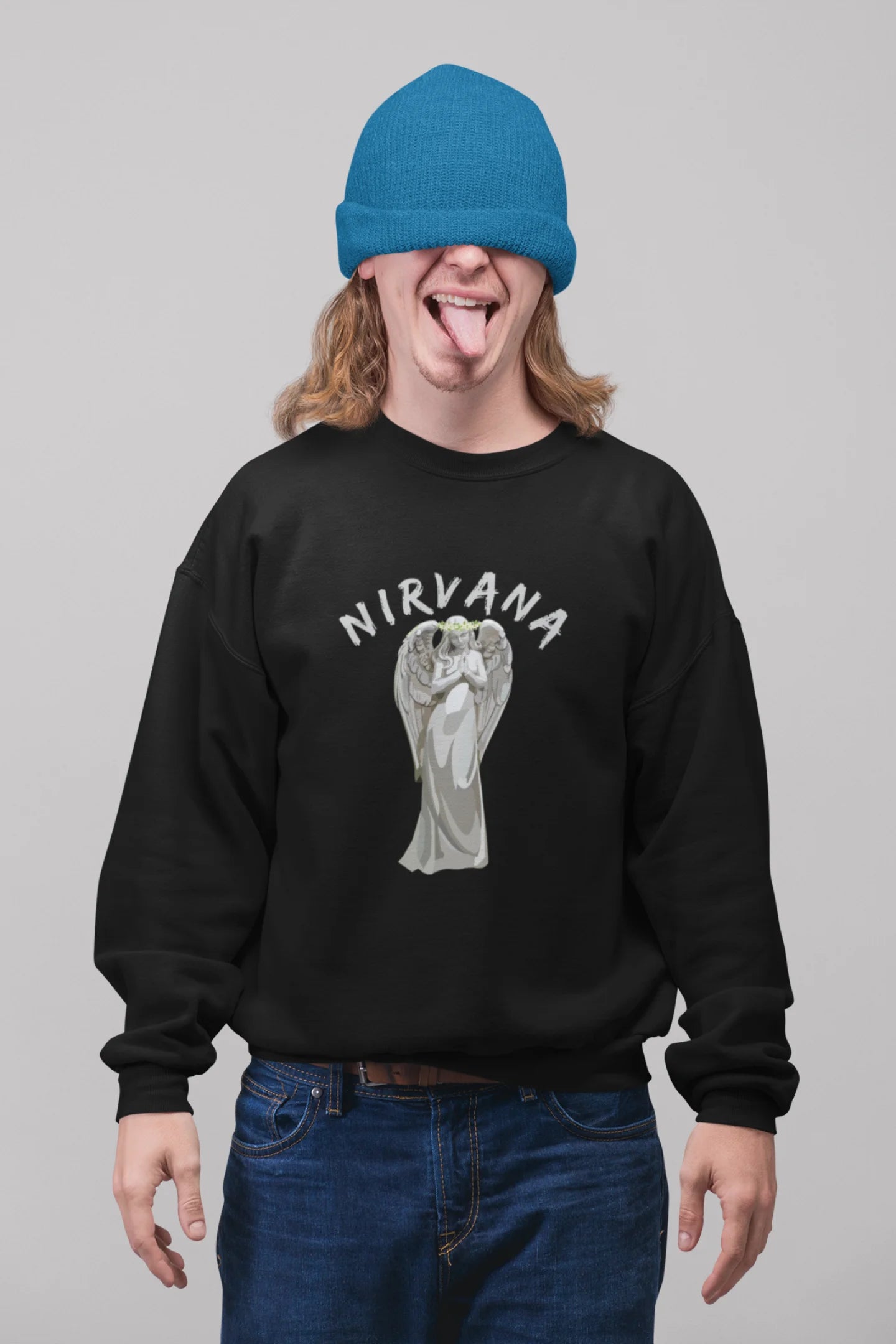 3rd front image of male model wearing a black sweatshirt featuring a design of a winged angel with the text "Nirvana" above it. Ideal for fans of Nirvana and those who love grunge aesthetics.