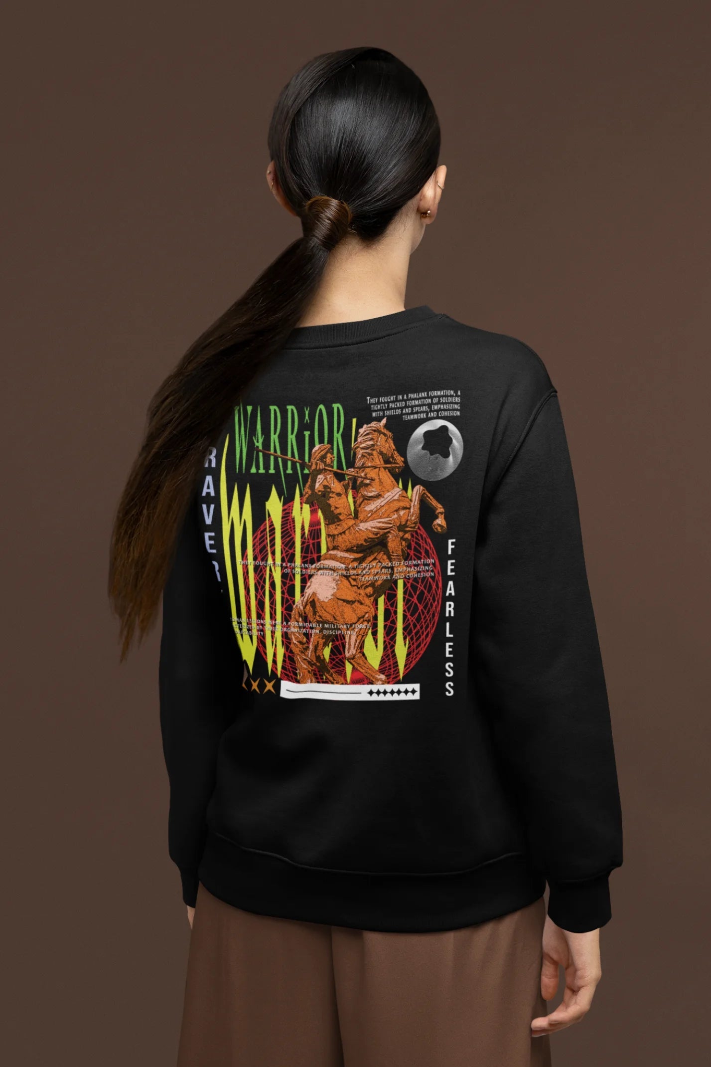 Back view of a female model wearing a black sweatshirt with a brutalist warrior and horseback battle design.