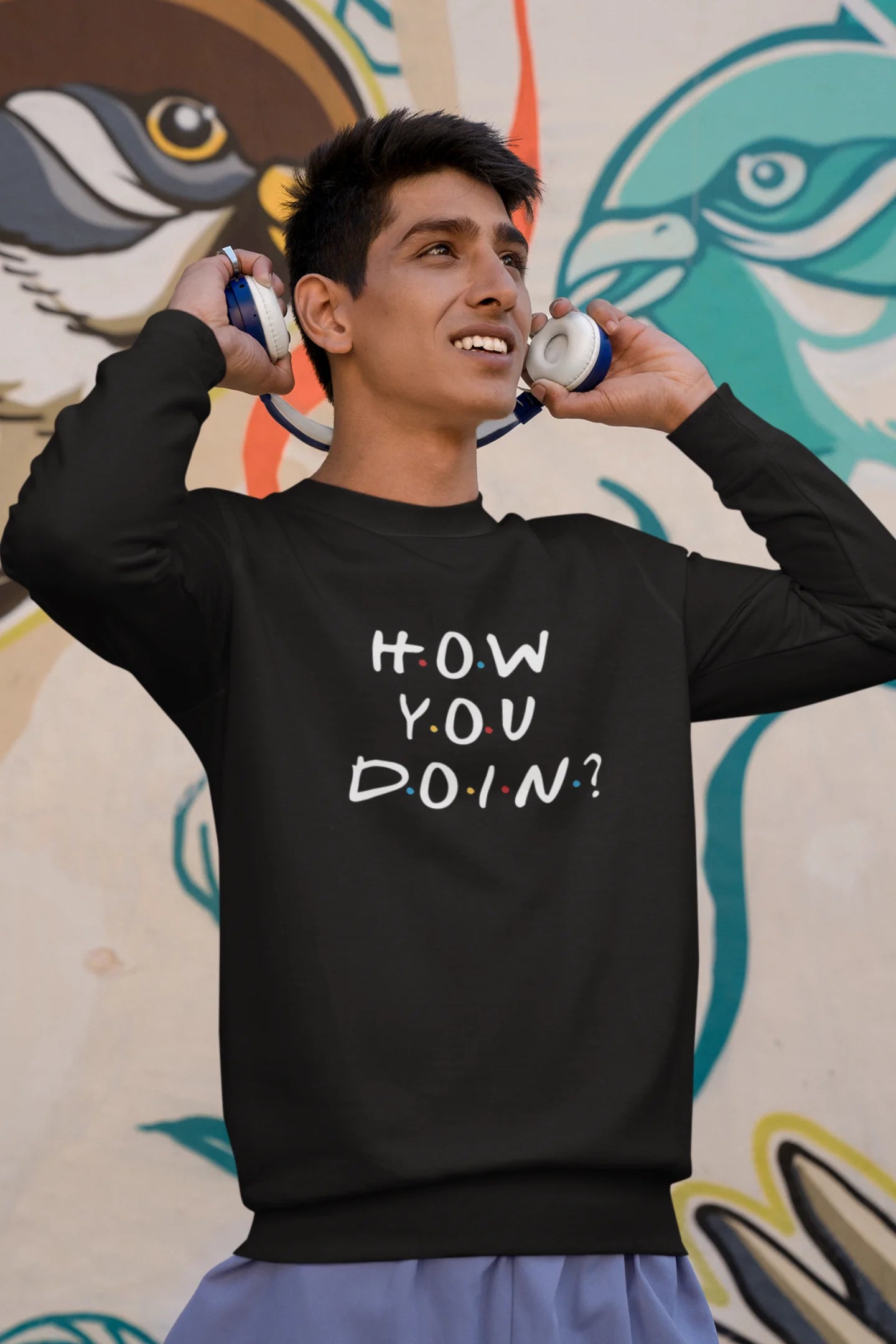 Second image of male model wearing black sweatshirt with F.R.I.E.N.D.S series inspired designs, embodying Joey's famous catchphrase 'How You Doin'?