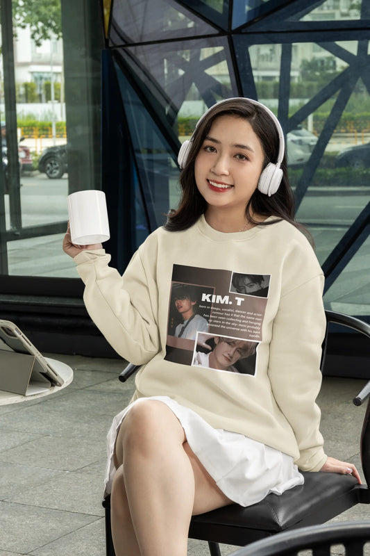 Second front view of female model wearing a cream sweatshirt featuring a bold design inspired by BTS member Kim Taehyung (V). Ideal for BTS fans (ARMY) and K-Pop enthusiasts.