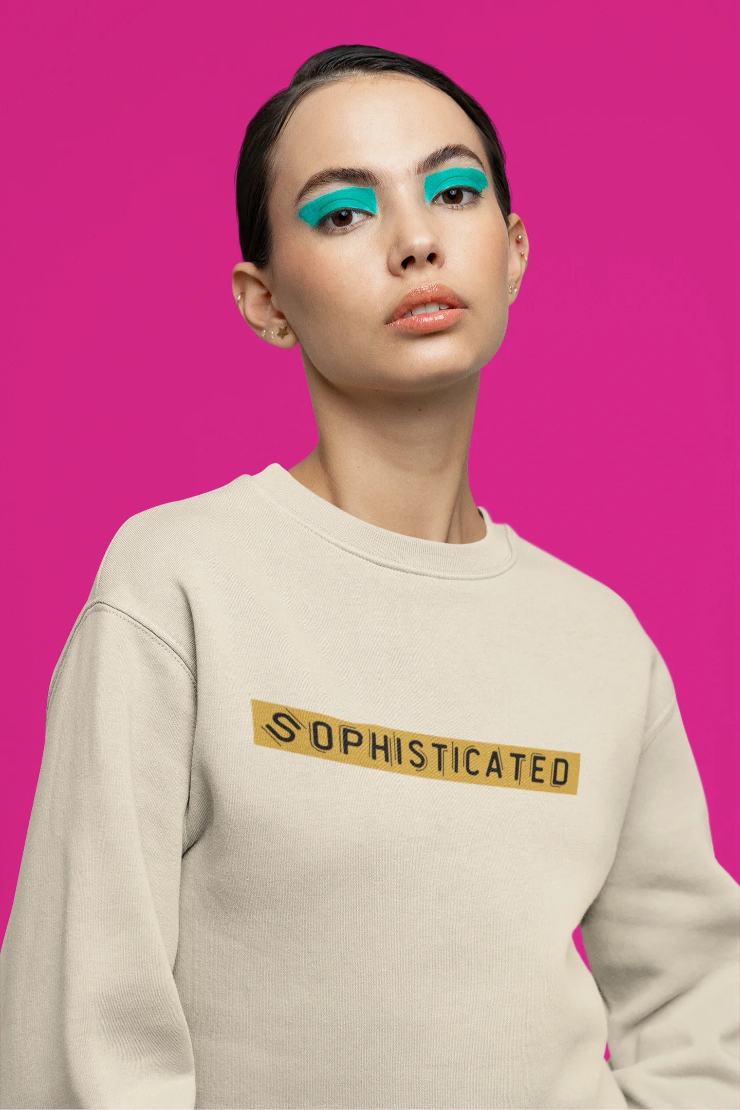 Fourth front view of a female model wearing a cream sweatshirt with a sophisticated brutalist design featuring a Greek god statue.