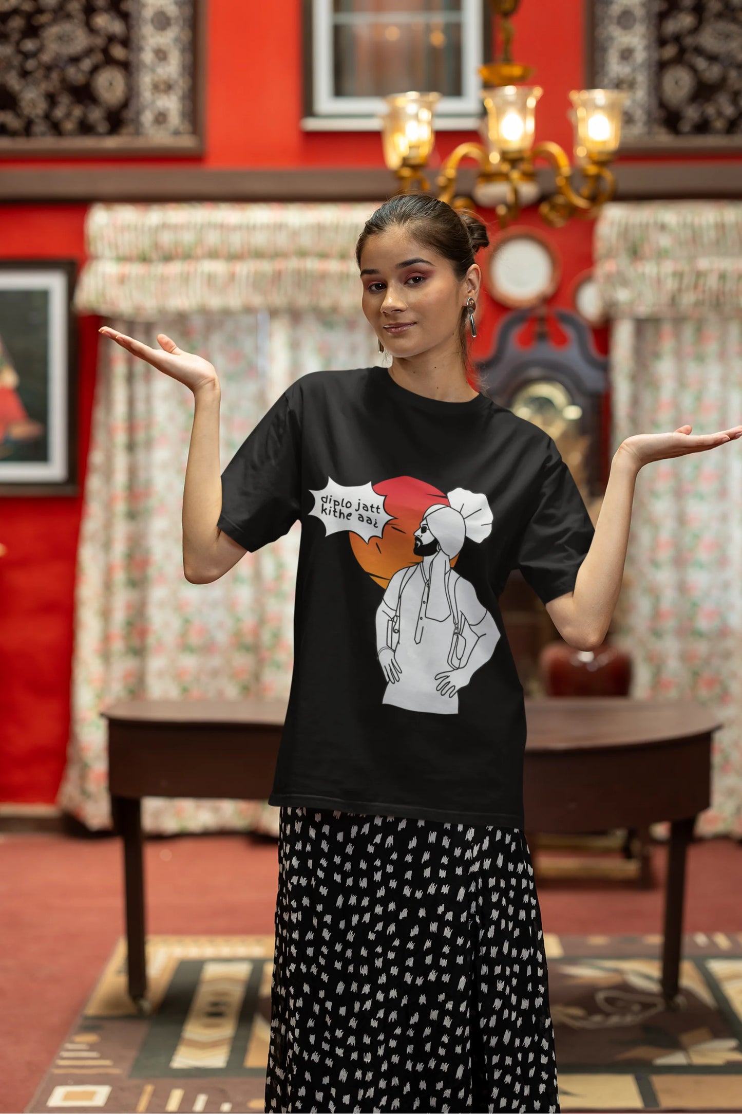 Third image of a female model wearing a black oversized tshirt with a A portrait of Diljit Dosanjh wearing a stylish outfit, with the text "Diplo Jatt Kithe Aai" prominently displayed in the background. The design captures the artist's charisma and the energy of the hit song, making it a must-have for fans of Diljit Dosanjh and Diplo alike.