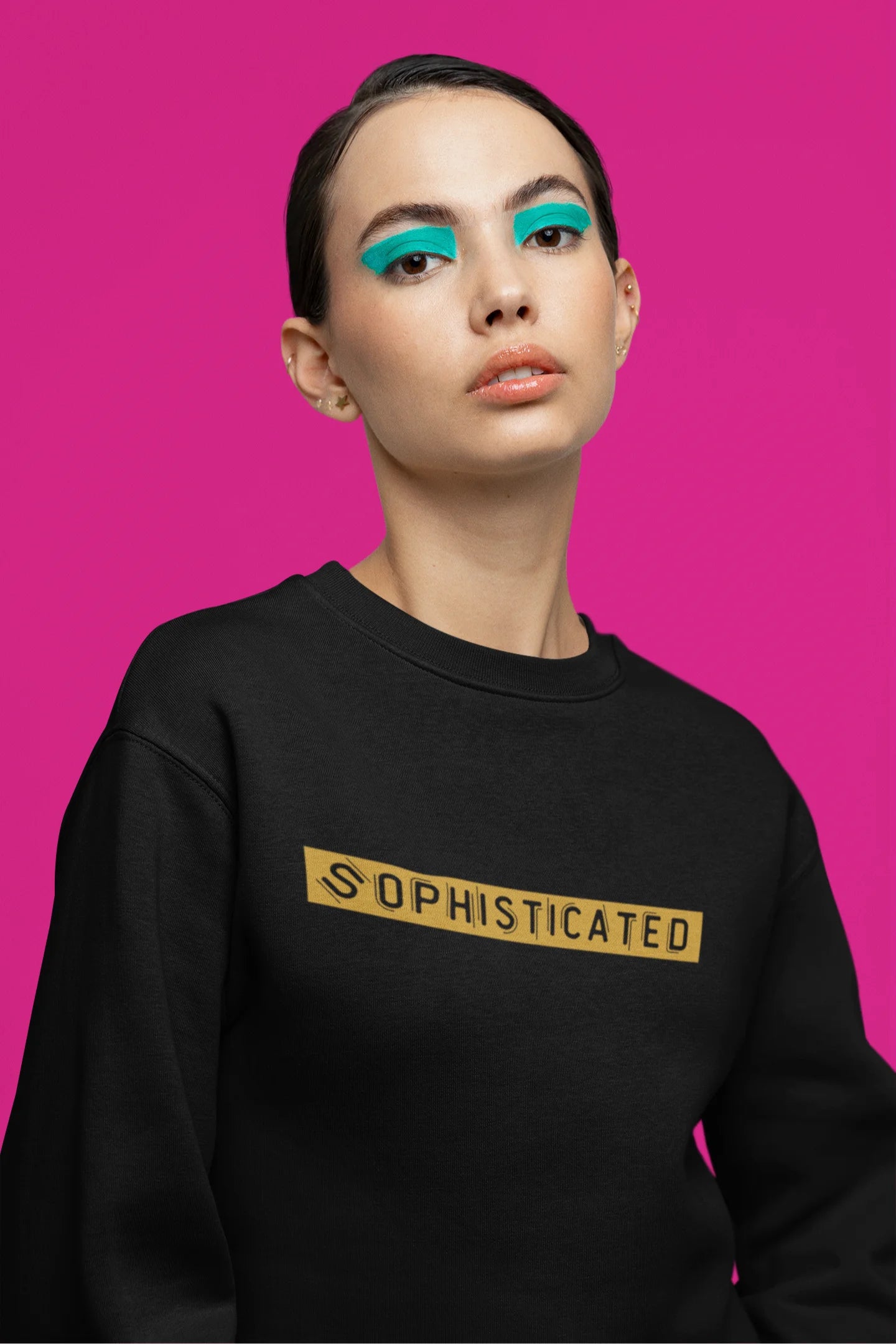 Third front view of a female model wearing a black sweatshirt with a sophisticated brutalist design featuring a Greek god statue.