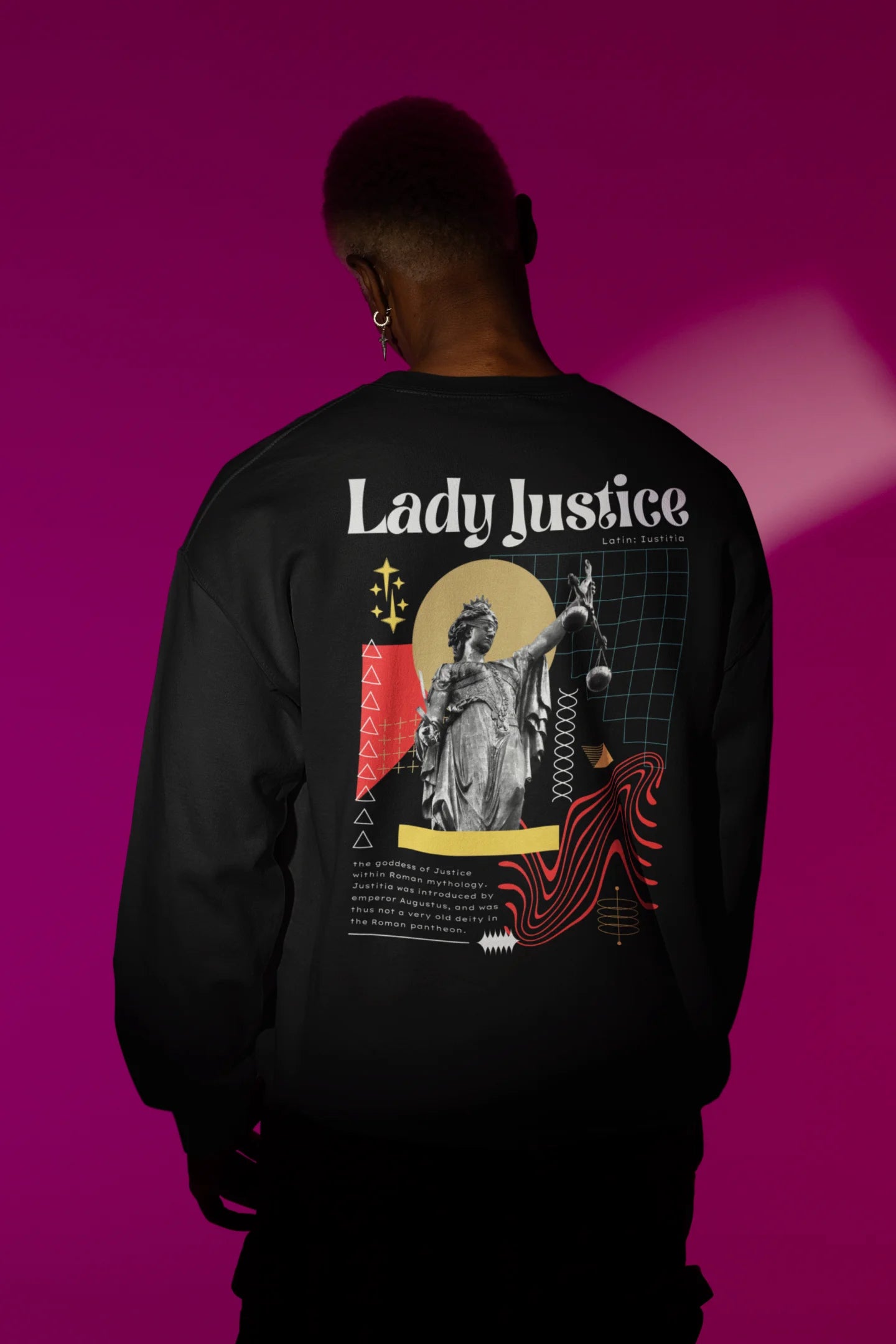 Back view of a male model wearing a black sweatshirt with a brutalist Lady Justice statue design.