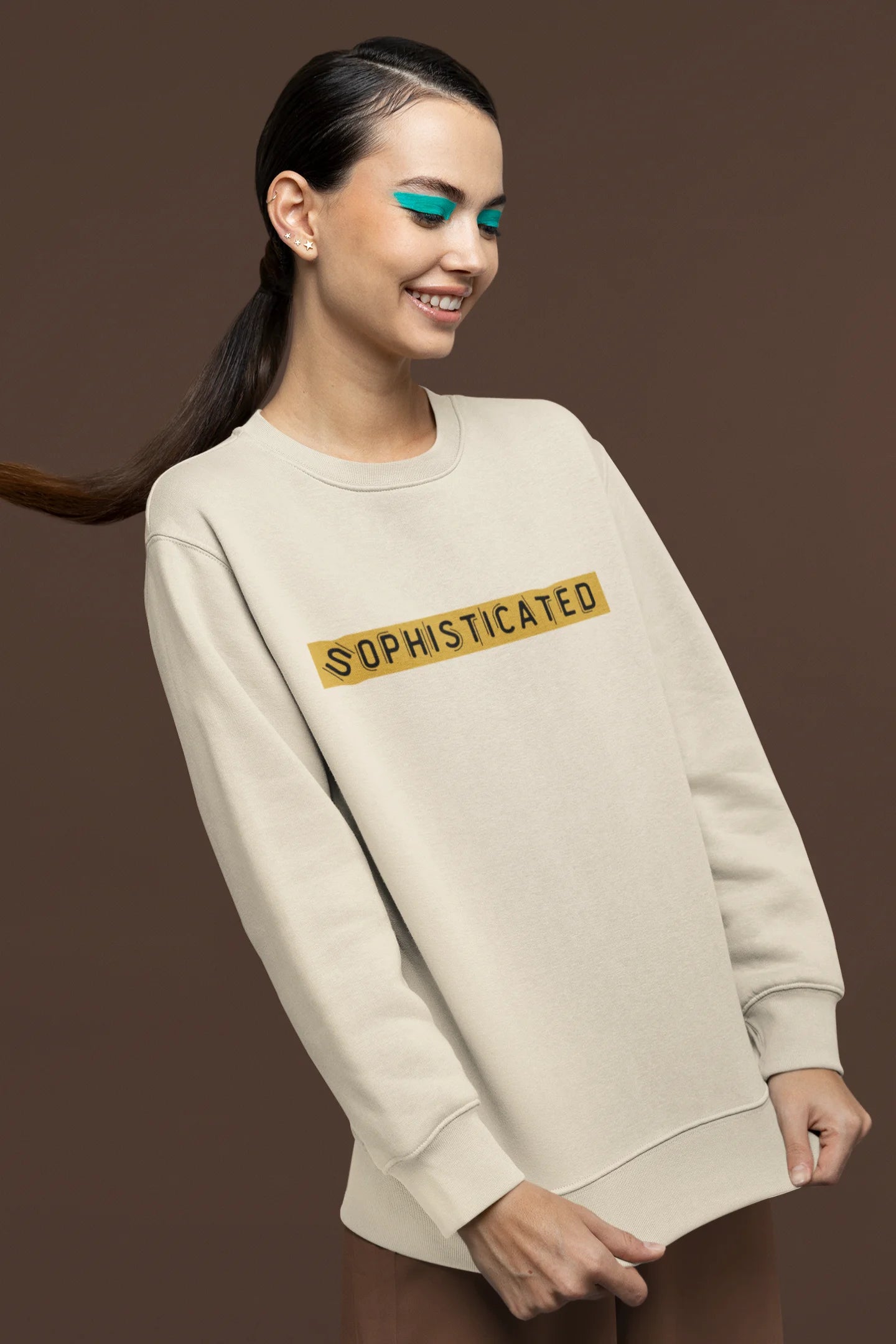 Second front view of a female model wearing a cream sweatshirt with a sophisticated brutalist design featuring a Greek god statue.