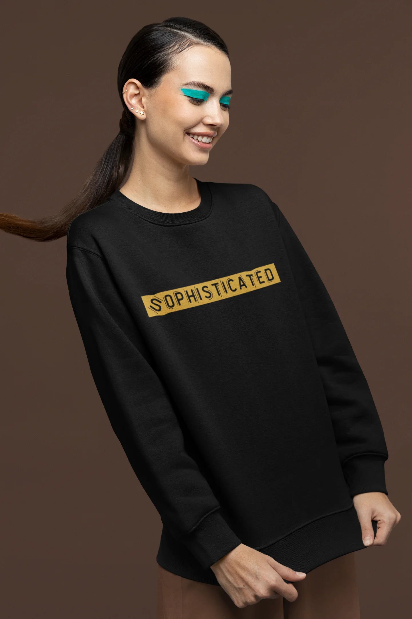 First front view of a female model wearing a black sweatshirt with a sophisticated brutalist design featuring a Greek god statue.