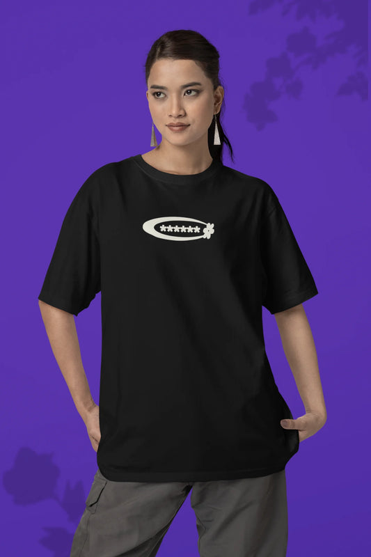 First front of a female model model wearing a black with a design featuring berry bushes overflowing with fruit, symbolizing the abundance and beauty of nature.