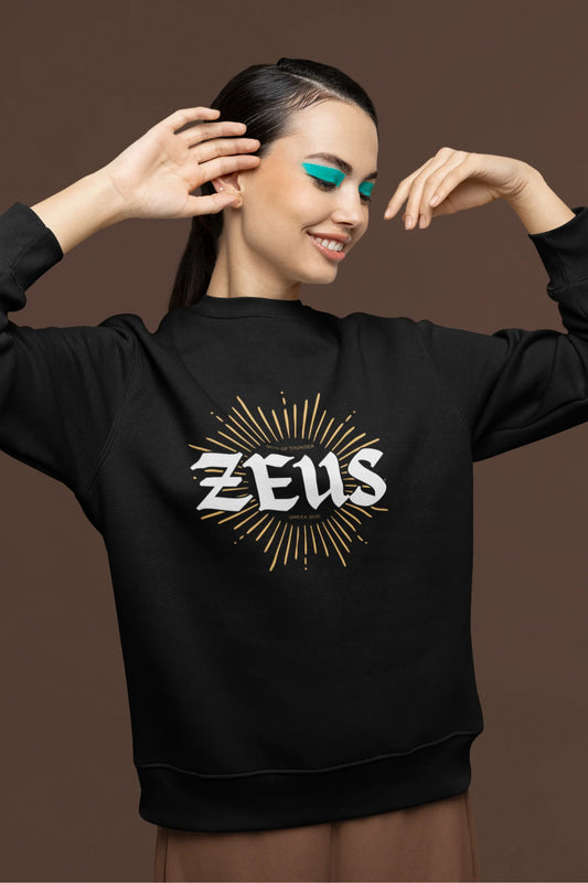 First front view of a female model wearing a brutalist-inspired black sweatshirt with a stylized image of Zeus, king of the gods, in a concrete-like design.
