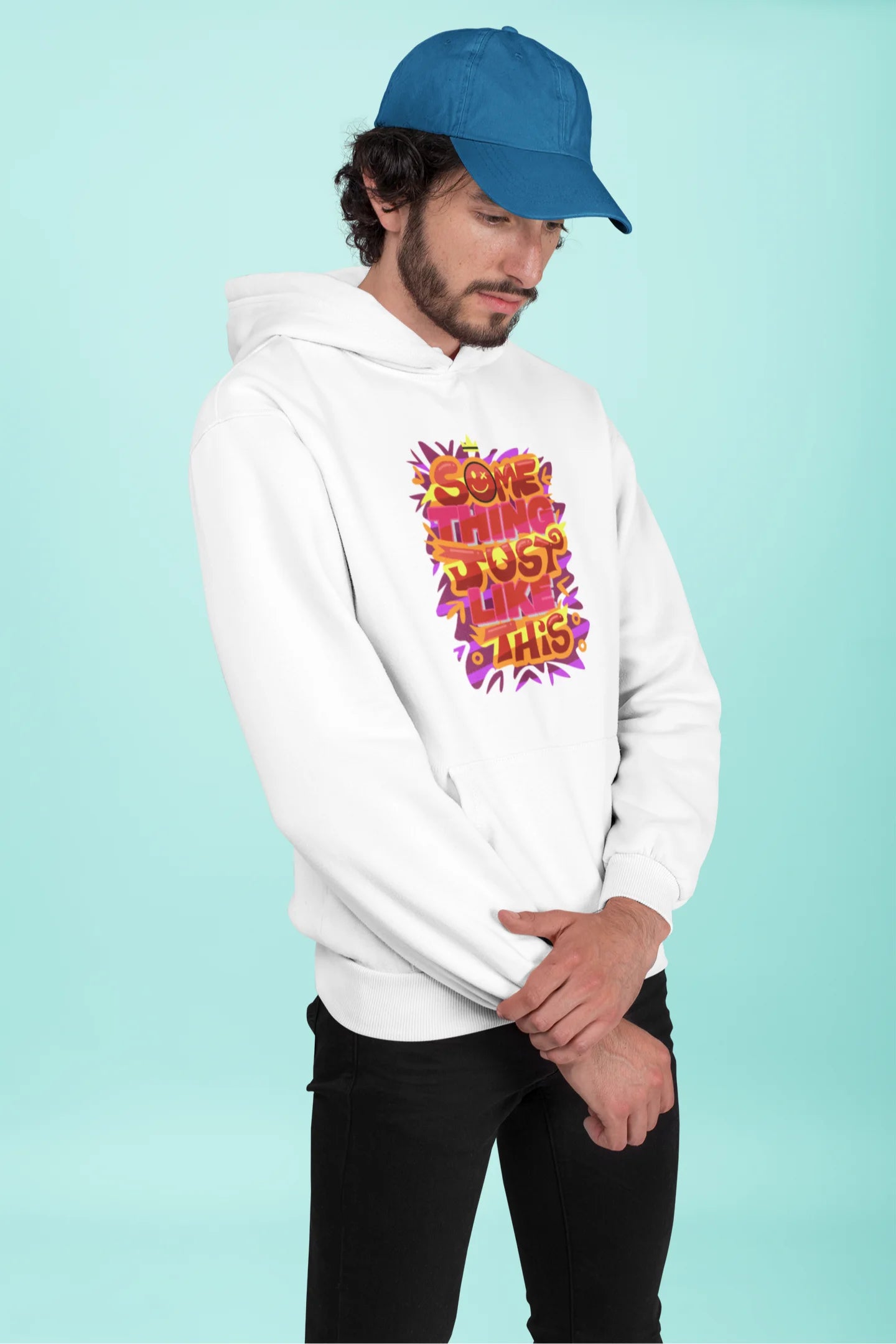 Second front view of a male model wearing an off-white hoodie featuring the designs inspired from Coldplay's "Something Just Like This" music video.