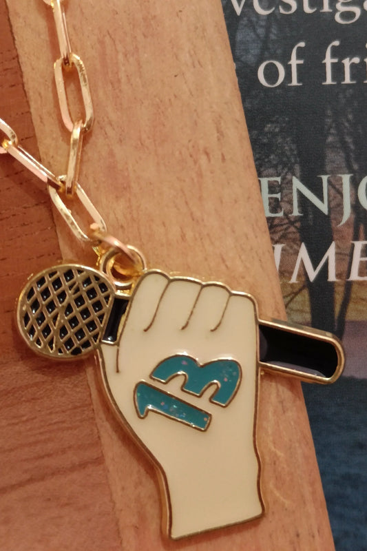 Second image of a taylor swift 13 themed anti tarnish gold chain.