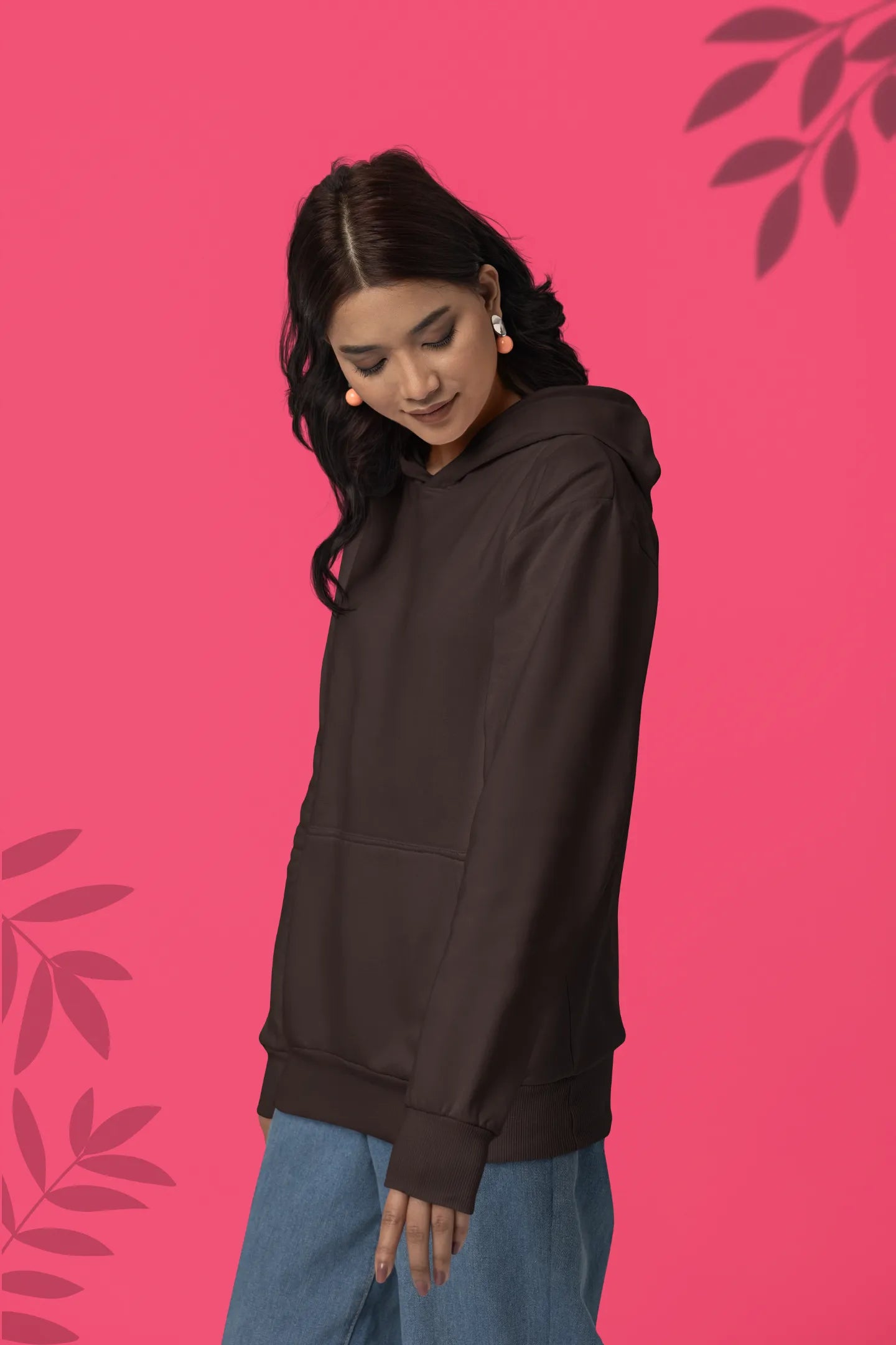Second front view female model wearing a chocolate brown hoodie with a design of a fox and its cub in a traditional Japanese landscape.