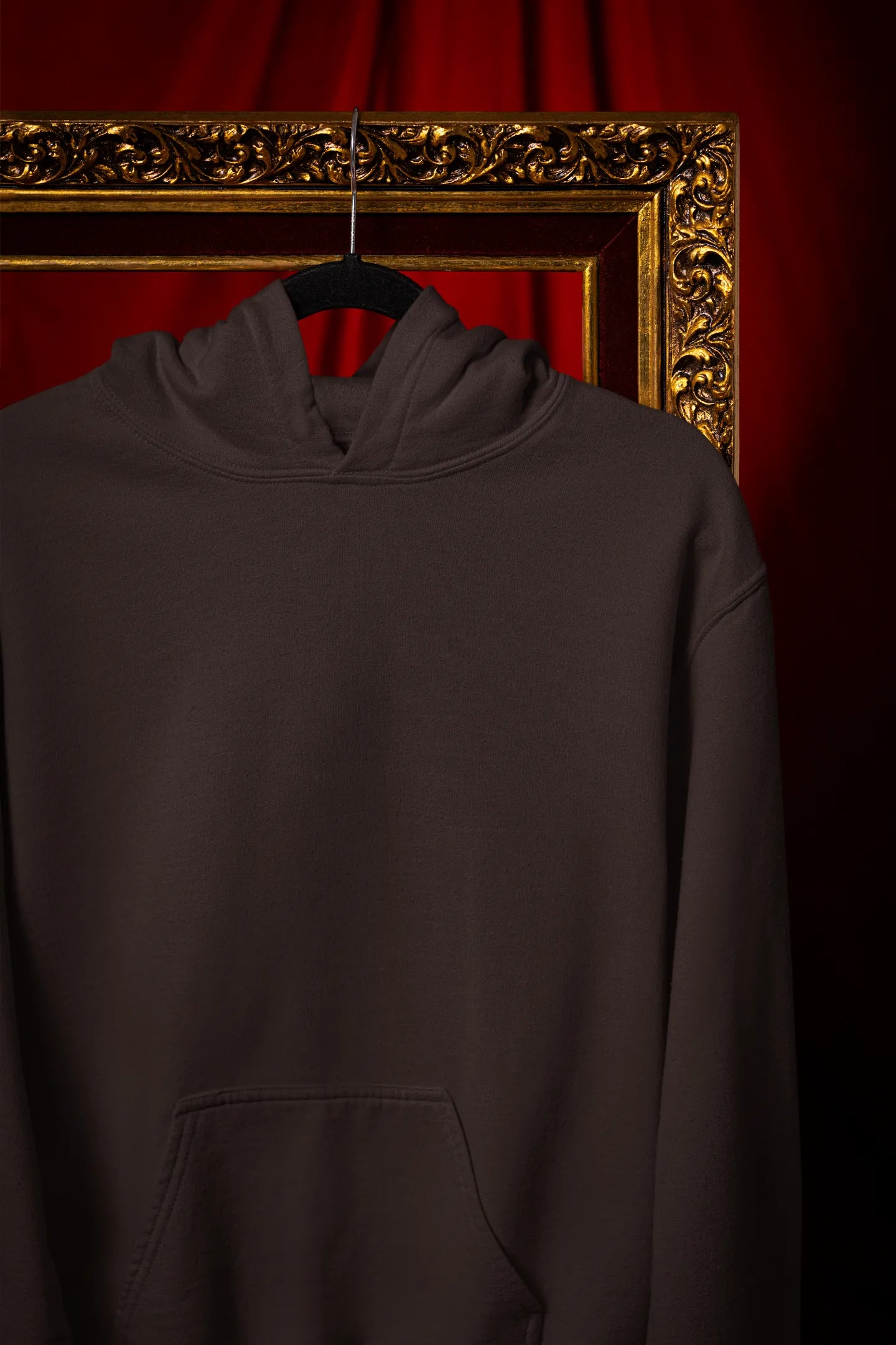 Front view female of a chocolate brown hoodie with a design of a fox and its cub in a traditional Japanese landscape.