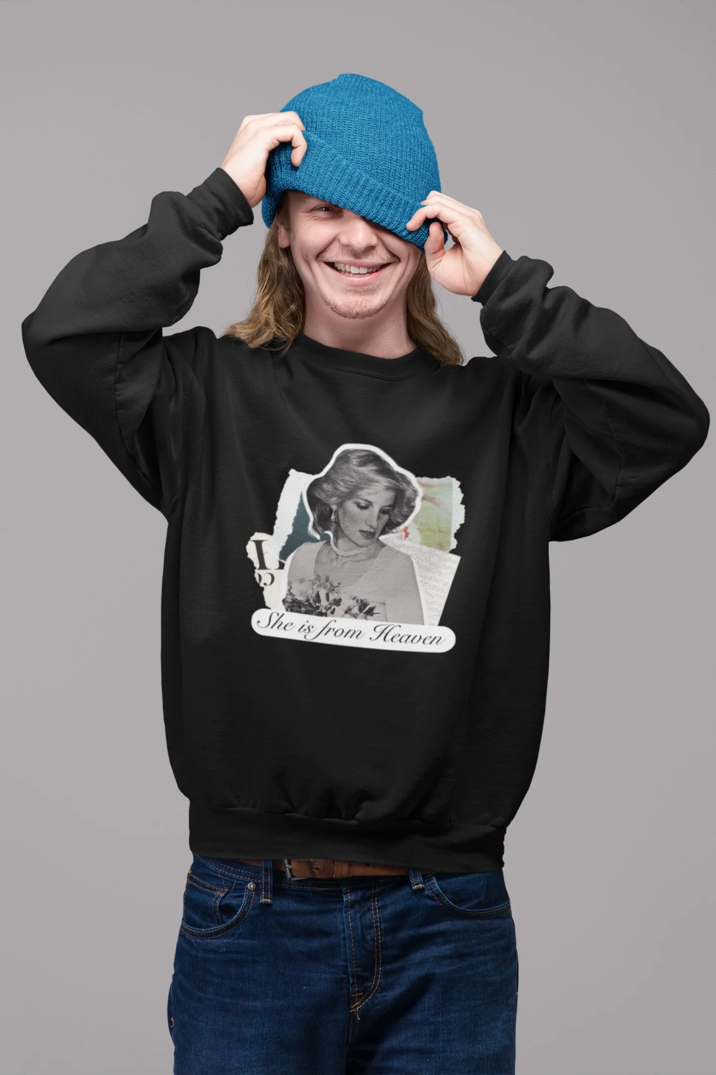4th front view of male model wearing a black sweatshirt featuring a black and white photo of Princess Diana with the text "She is from Heaven." Ideal for fans of Princess Diana and those who want to celebrate a royal icon.