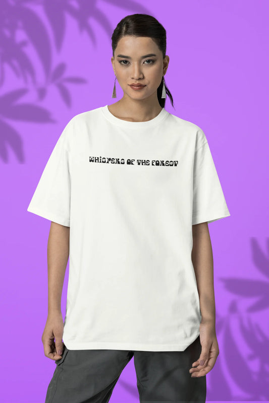 First front view of a female model wearing a off-white oversized tee with a design featuring three different types of butterflies, symbolizing the beauty and diversity of nature.