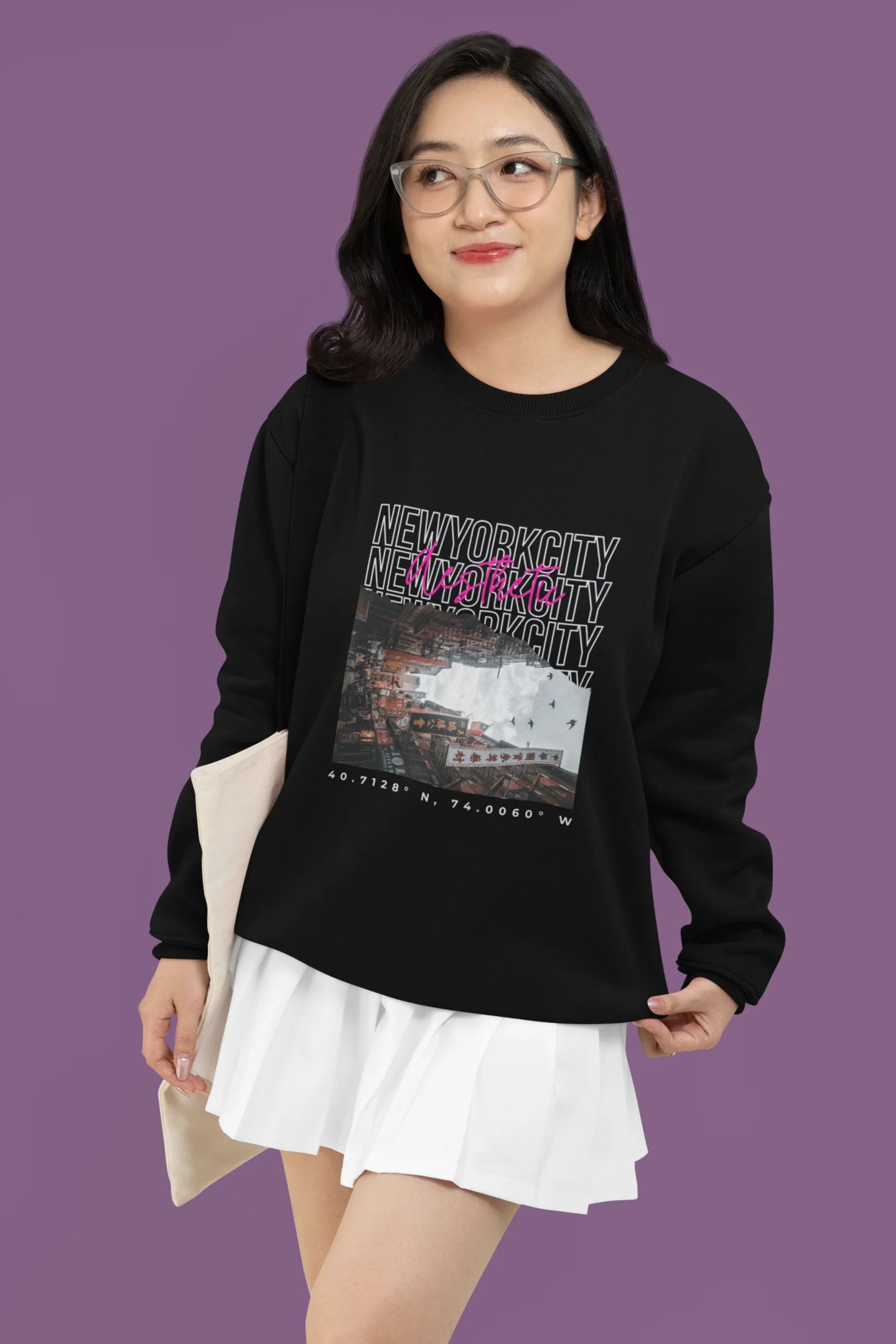 4th front view of a female model wearing a black sweatshirt with a New York City skyline design, offering a relaxed urban aesthetic.
