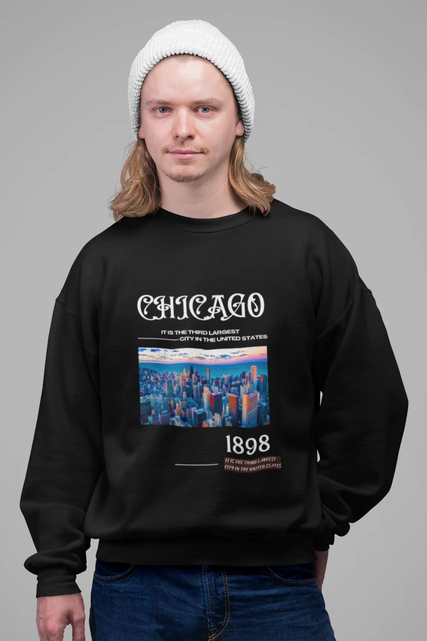 3rd front view of male model wearing a black sweatshirt with a Chicago skyline design, offering a relaxed urban aesthetic.