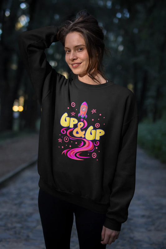 Second front view of a female model wearing an black sweatshirt with a rocket ship design and the text "Up & Up".