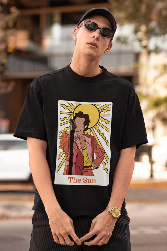 First Image of man wearing black Oversized t-shirt inspired by 'The Sun' - perfect for fans of Harry Styles and One Direction