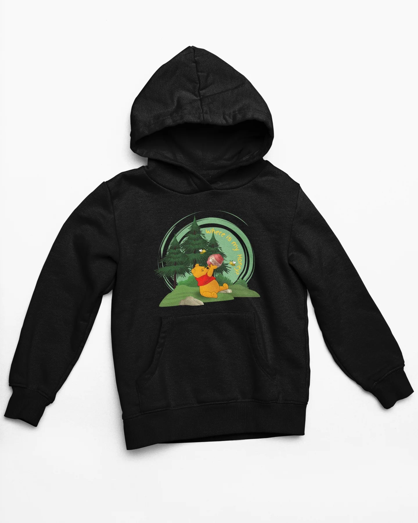 Close up front view of a black hoodie with a Winnie the Pooh design, showing the Disney bear eating honey from a jar in a forest.