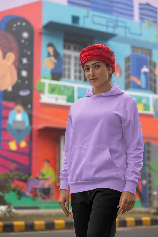 First front view of a female model wearing a comfortable dirty purple hoodie featuring the phrase "Vibe Teri Meri" in a modern font on a portrait of Diljit Singh holding up a sunflower, perfect for expressing your unique style and feeling the rhythm.