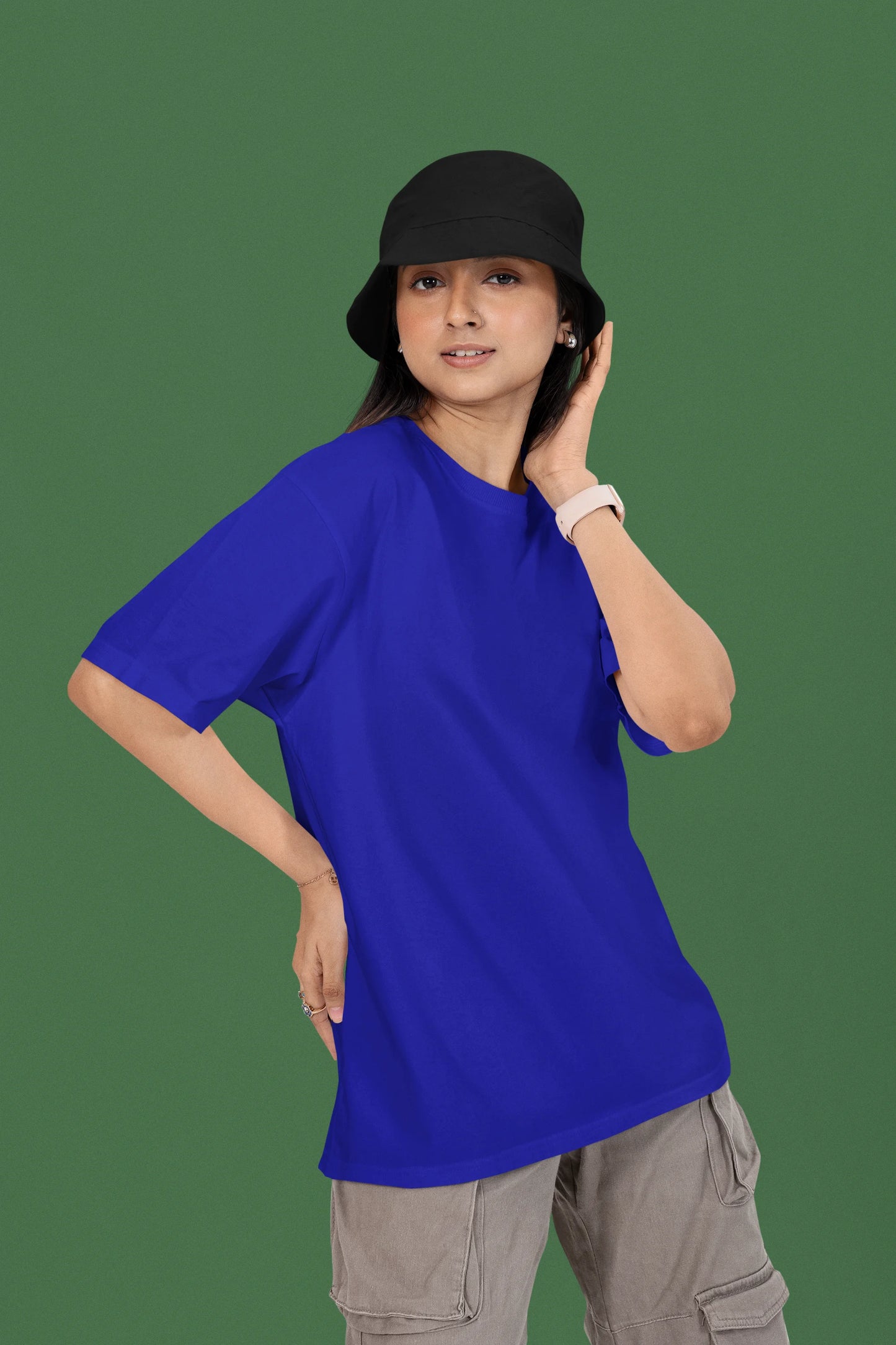 2nd front view of a female model wearing a royal blue oversized t-shirt featuring a couple dancing in the moonlight, inspired by Ed Sheeran's themes of love.
