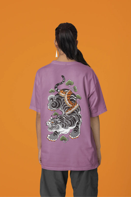 Back view of a female model wearing a dirty purple oversized tee with a Japanese art style tiger design.