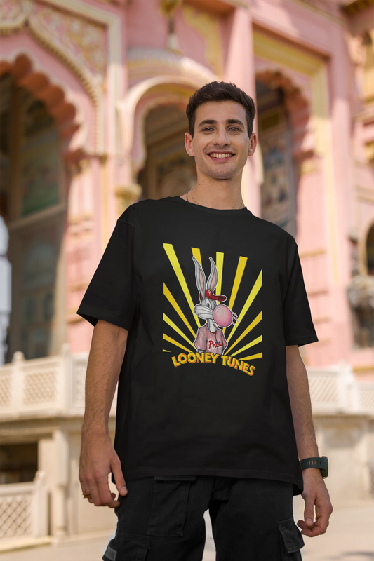 Second image of male Model showcasing black Bugs Bunny oversize t-shirt from Looney Tunes, featuring a bold Bugs Bunny design