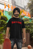 Second front image of a male model wearing a black oversized t-shirt featuring a Diljit Dosanjh-inspired design with the text 