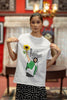 Second front view of female model wearing a off-white oversized t shirt with a design of Diljit Dosanjh holding a sunflower, with the text 