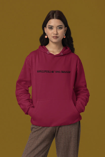 Fourth front view of a female model wearing a maroon hoodie with a design featuring three different types of butterflies, symbolizing the beauty and diversity of nature.