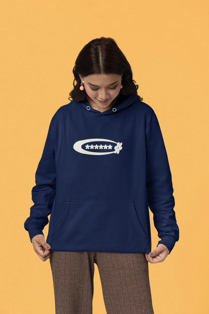 Second front of a female model model wearing a navy hoodie with a design featuring berry bushes overflowing with fruit, symbolizing the abundance and beauty of nature.
