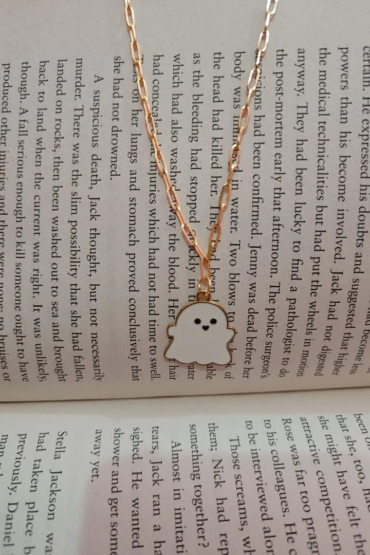 Second view of an anti tarnish gold chain necklace featuring a cute white ghost design.