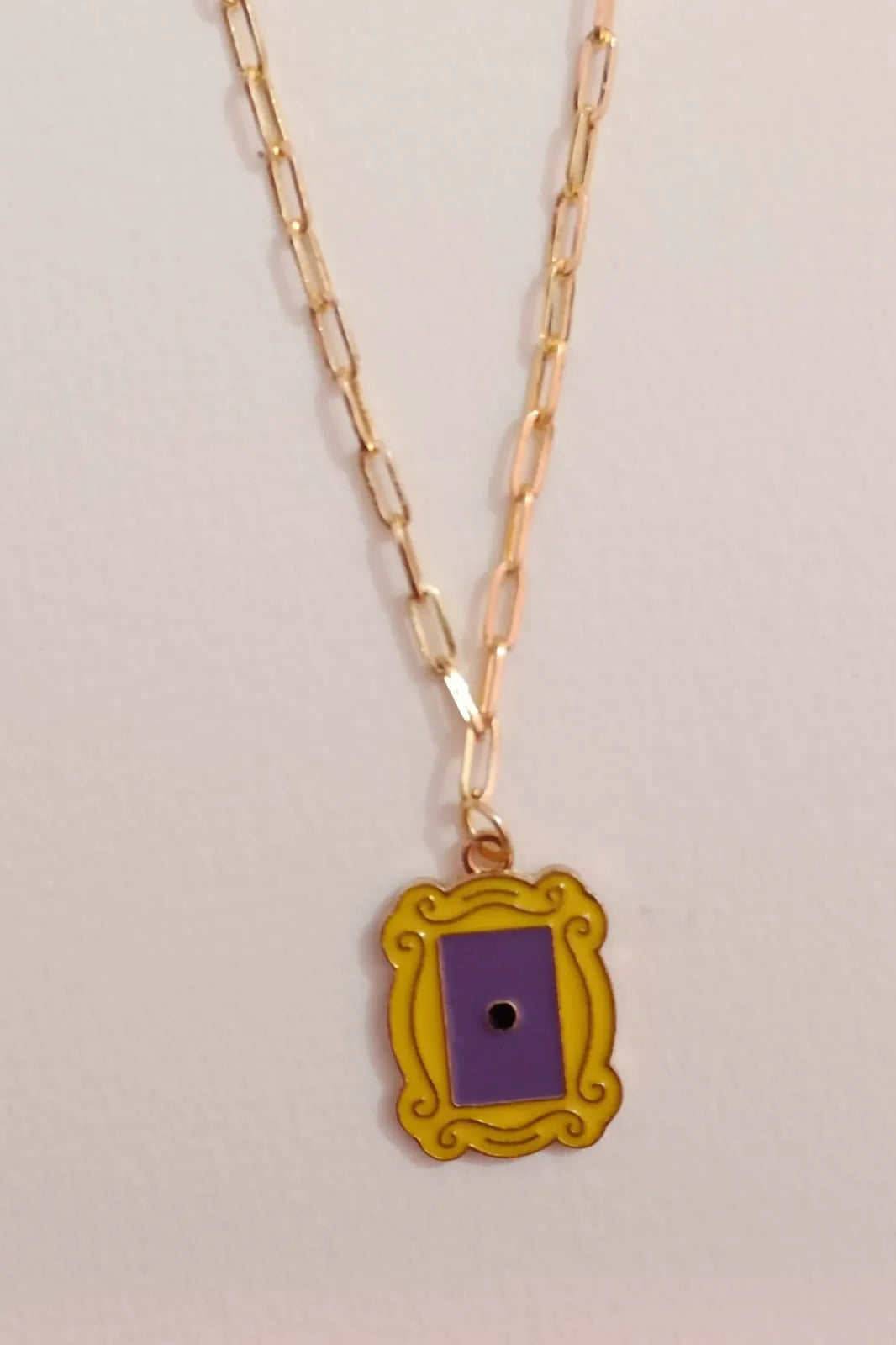 First image of a F.R.I.E.N.D.S themed anti tarnish gold chain.