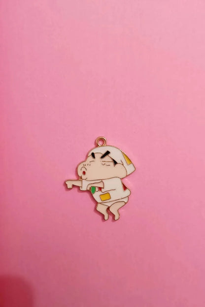 Third view of a charm featuring a mischievous Shinchan design.
