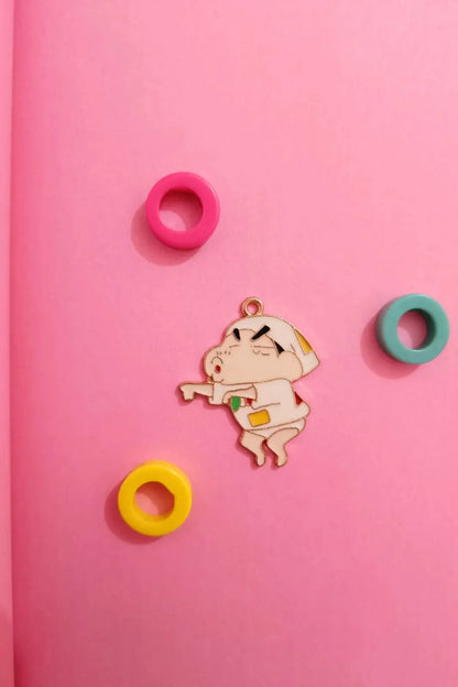 Fifth view of a charm featuring a mischievous Shinchan design.